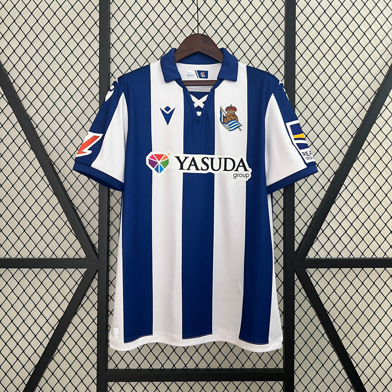 Camisa Real Sociedad Home 24/25 - Macron Torcedor Masculina Lançamento